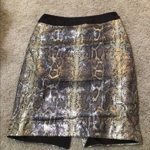 Snake print pencil skirt.
